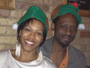 Five weeks later: Filled out and spreading holiday cheer with hubby.
